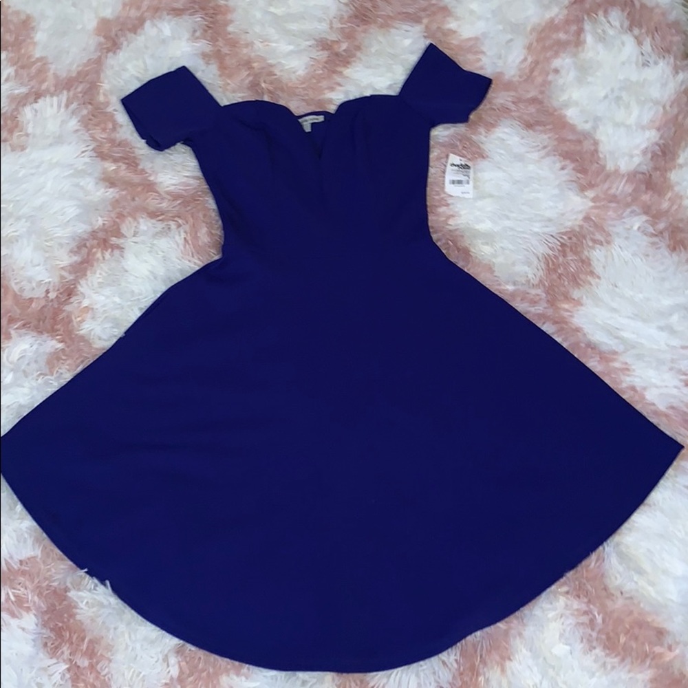 Blue off the shoulder dress.